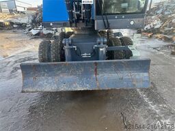 Fuchs MHL 320 S5 Material handler with grab. WATCH VIDEO