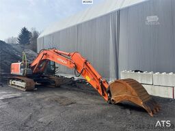 Hitachi ZX210LC-3 crawler excavator with digging bucket, g