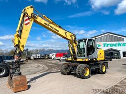Escavatore gommato NEW HOLLAND MH Plus / Verstellausleger / 3 Stück!