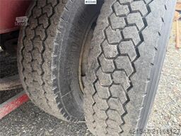 NC BT-24 3-axle equipment trailer with hydraulic ramp