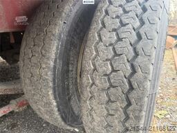 NC BT-24 3-axle equipment trailer with hydraulic ramp