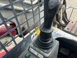 Takeuchi TL130 with forks and loader bucket