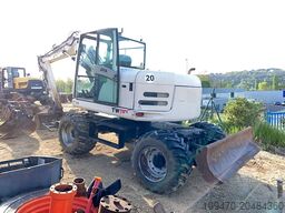 Terex TW110 with two-piece offset boom and 3 buckets