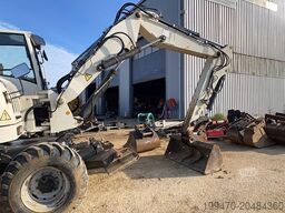 Terex TW110 with two-piece offset boom and 3 buckets
