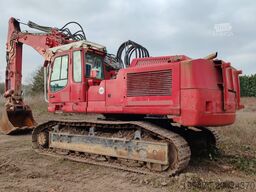 Liebherr R 944 C V Litronic with long demolition boom (21m), variable-angle boom and 2 buckets