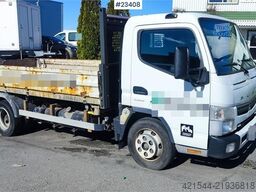 Mitsubishi Fuso Canter 4x2 flatbed truck for sale as a repair
