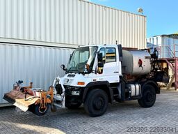 Unimog U400 mit Bitumspritze Breining + Besen