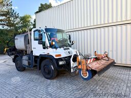 Unimog U400 mit Bitumspritze Breining + Besen