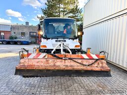 Unimog U400 mit Bitumspritze Breining + Besen