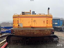 Åkerman H10B crawler excavator with digging bucket.
