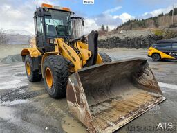 New Holland W130B wheel loader with a bucket