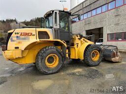 New Holland W130B wheel loader with a bucket