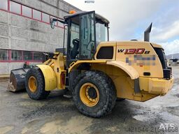 New Holland W130B wheel loader with a bucket