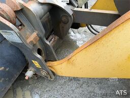New Holland W130B wheel loader with a bucket