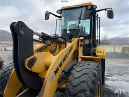 New Holland W130B wheel loader with a bucket