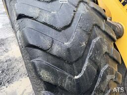 New Holland W130B wheel loader with a bucket