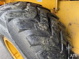 New Holland W130B wheel loader with a bucket