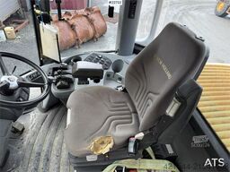 New Holland W130B wheel loader with a bucket
