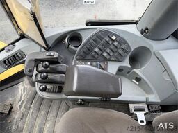 New Holland W130B wheel loader with a bucket