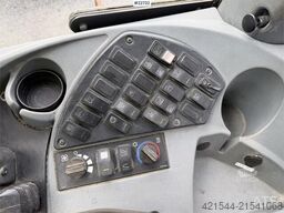 New Holland W130B wheel loader with a bucket
