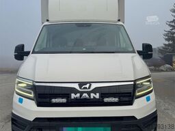 MAN TGE 4x2 box truck with side door and Zepro tail li