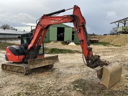 Kubota KX080-4 with 3 excavator buckets