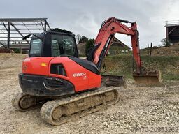 Kubota KX080-4 with 3 excavator buckets