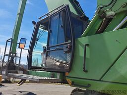 Sennebogen 850R with hydraulic rotating grapple