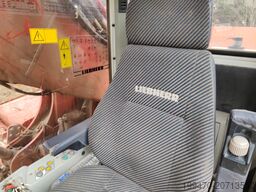 Liebherr R 954 B with long demolition boom (28m), standard boom and bucket