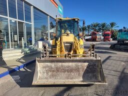 Komatsu WB93R-5. Mixta.