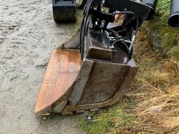 Kobelco SK135 SR LC tracked excavator with digging bucket