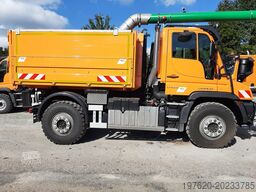 Mercedes-Benz Unimog U423 mit Abrollsystem und Mulde