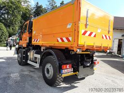 Mercedes-Benz Unimog U423 mit Abrollsystem und Mulde