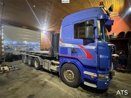 Scania R580 snow-prepared tridem hook loader with Joab ho