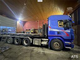 Scania R580 snow-prepared tridem hook loader with Joab ho