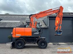 Hitachi ZX140W-6 SMP draaikantelstuk met grijper - airc...