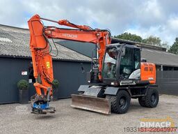 Hitachi ZX140W-6 SMP draaikantelstuk met grijper - airc...