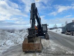 Volvo EC300EL crawler excavator w/ rototilt, cleaning an