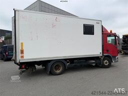 MAN TGL 8.220 4x2 box truck with a 2-ton lift
