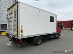 MAN TGL 8.220 4x2 box truck with a 2-ton lift