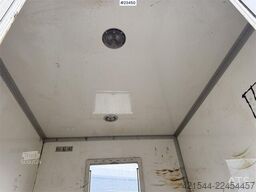MAN TGL 8.220 4x2 box truck with a 2-ton lift