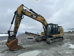 CAT 323FL with tilt and digging bucket