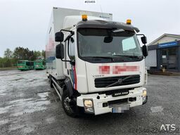 Volvo FL 4x2 box truck with a 1500 kg lift and remote co