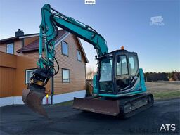Kobelco SK75SR-3E crawler excavator with rototilt, 4 bucke