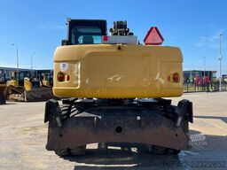 Caterpillar M313D VA - Outriggers + Blade