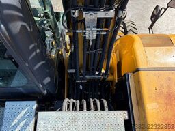 Caterpillar M313D VA - Outriggers + Blade