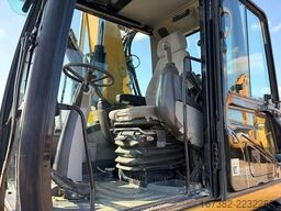 Caterpillar M313D VA - Outriggers + Blade
