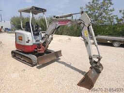 Takeuchi TB23R with 3 excavator buckets