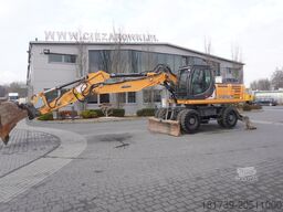 Case WX218 / 23t wheeled excavator /