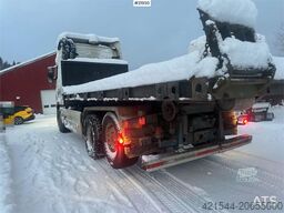 Volvo FH12 snow-plow equipped hook truck with Danish cab